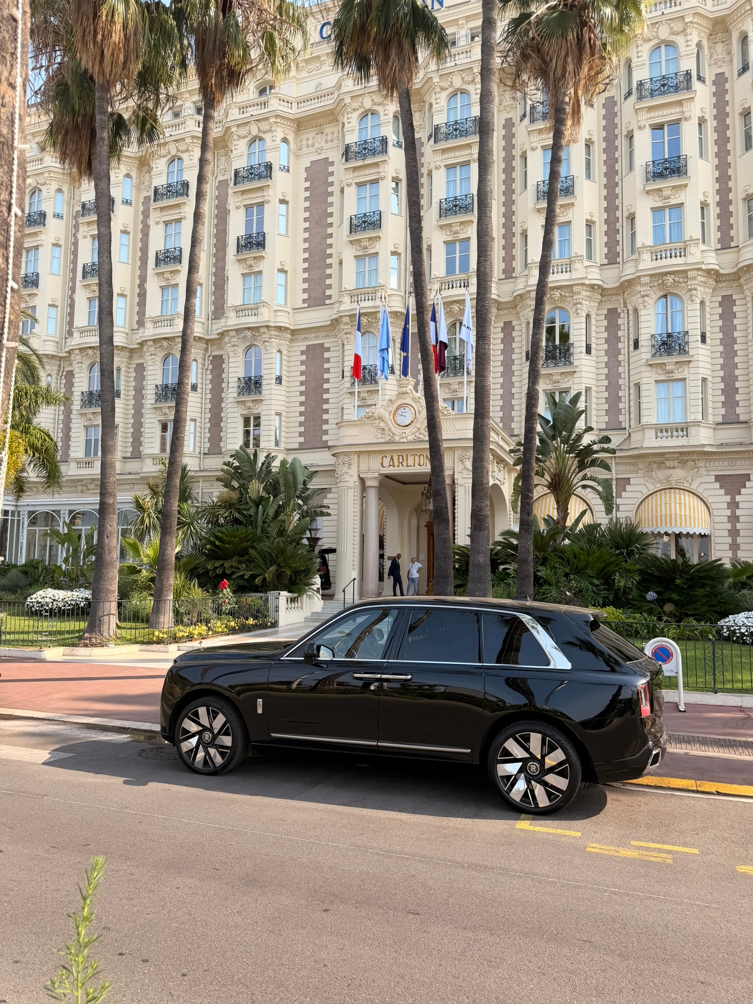 Rolls Royce Cullinan parked near the Eiffel Tower, Paris